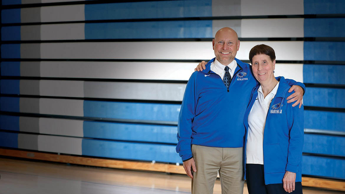 Betty Powell ’82, PM ’25 with Executive Director of Athletics Paul Vecchio