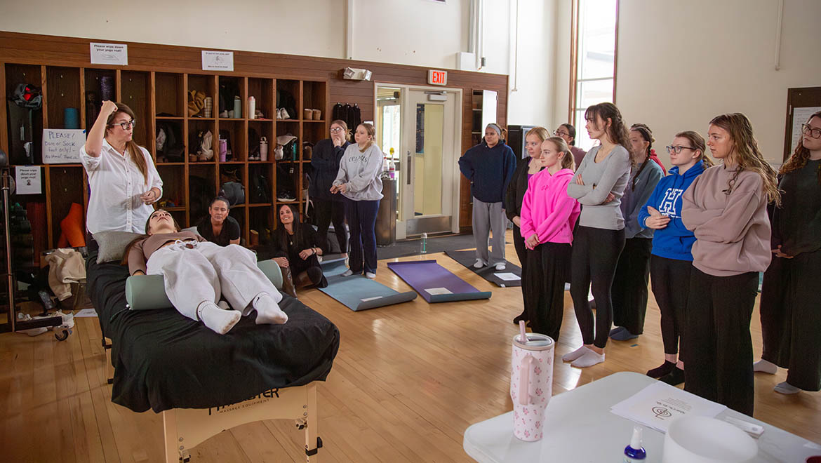 Hartwick College nursing students learning about wellness, meditation and yoga