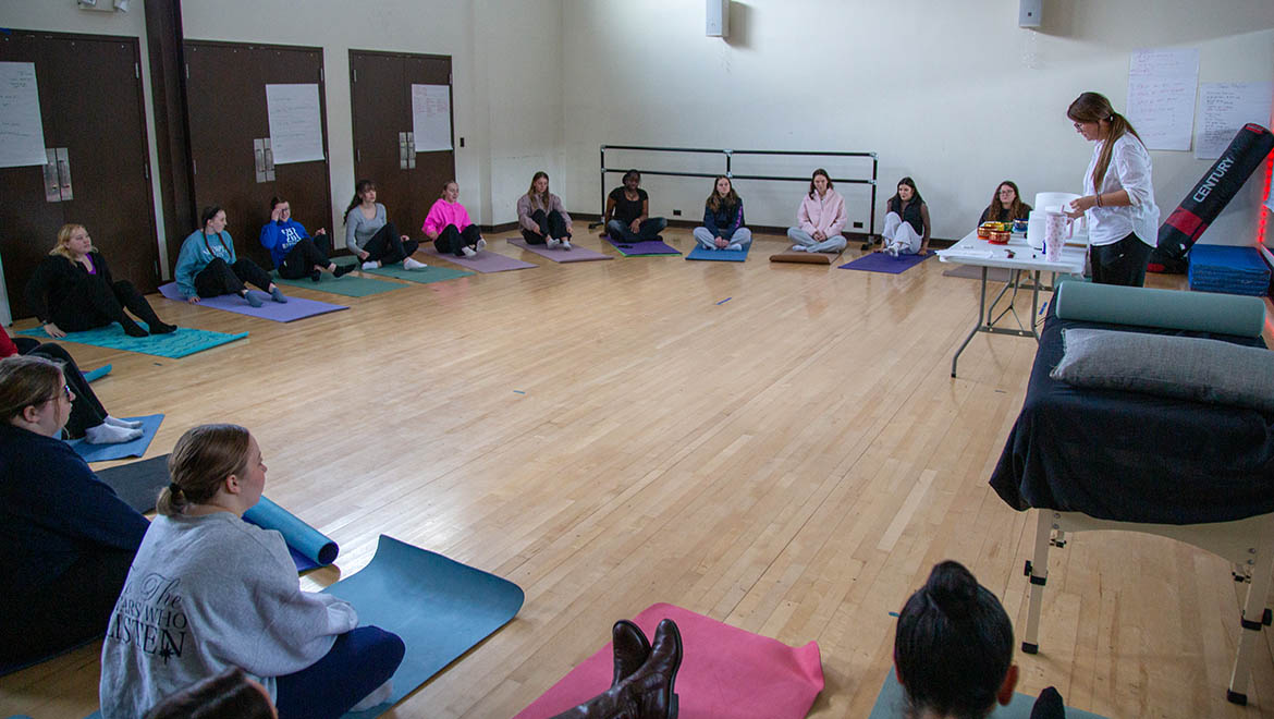 Hartwick College nursing students learning about wellness, meditation and yoga