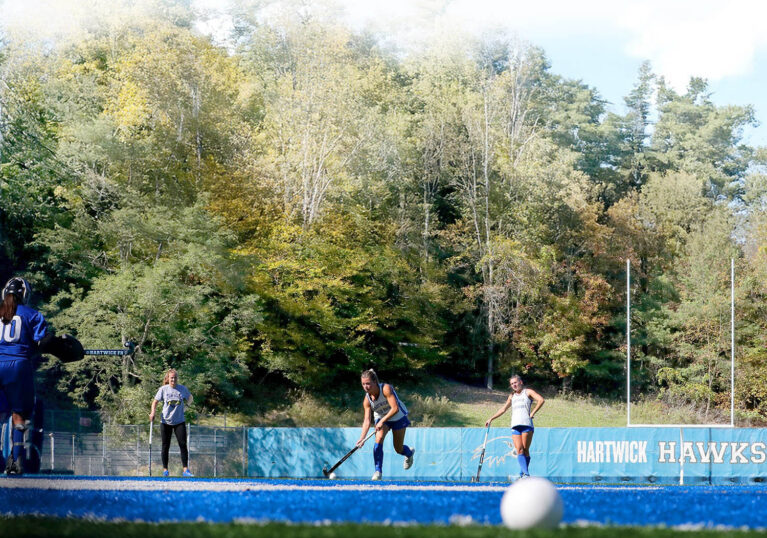 Hartwick College field hockey players on practice field