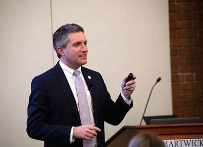 New York State Senator James Skoufis delivering The Leslie G. Rude Memorial Lecture
