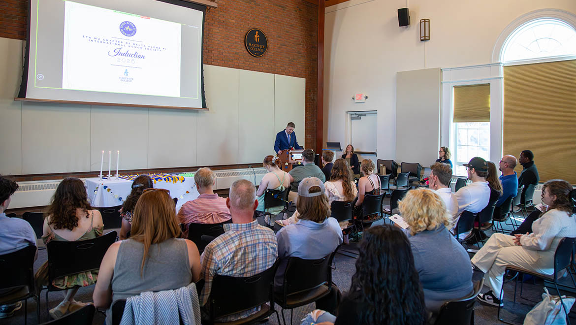 Hartwick College Eta Mu Chapter of Delta Alpha Pi academic honor society induction ceremony in Shineman Chapel House