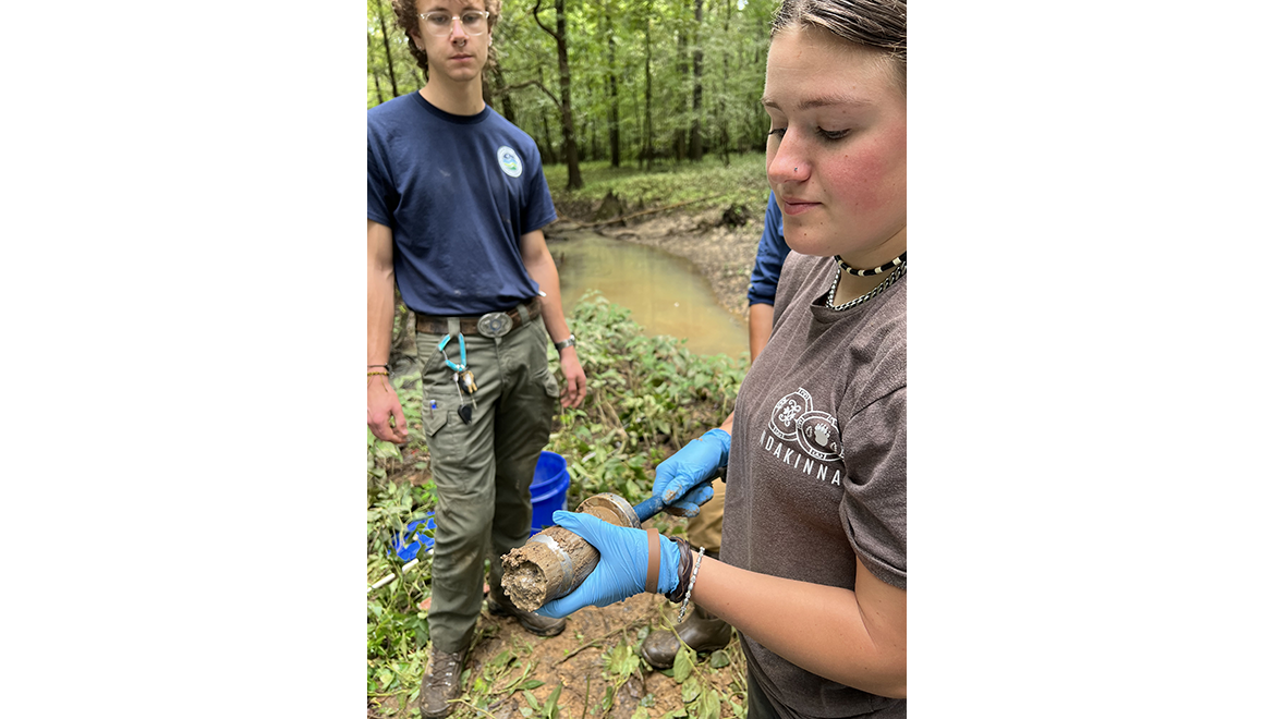 Miakoda Feldman doing field work