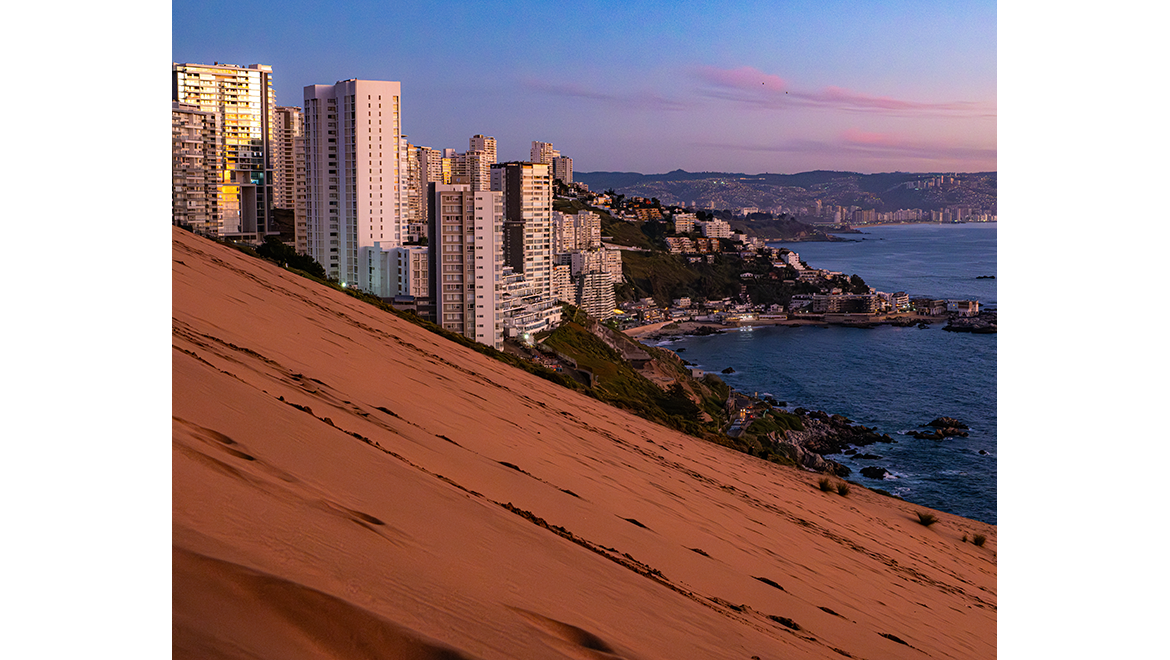 Concón coastal city in the Valparaíso region of Chile with beautiful beaches, surfing, and massive sand dunes, cityscape highrise buildings along the coast