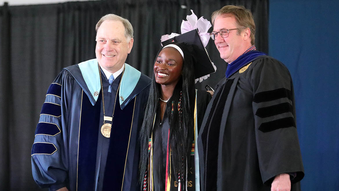 Amelia Williams ’26 with President Mullen and Professor Buthman Abraham L. Kellogg Oratorical Prize