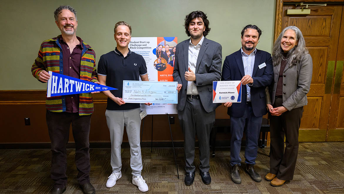 Professor of Practice Scott DeJong, Noah Brueggemann, Logan Doolen ’27, Noah Goldblatt Executive Director of the Griffiths Center for Innovation & Collaboration and Global Engagement, Professor of Economics Carli Ficano