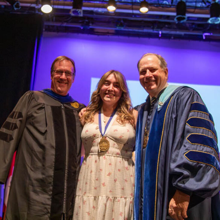John Christopher Hartwick Scholar Hannah Mae Gilliand with Professor Buthman and President Mullen