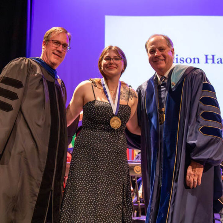 John Christopher Hartwick Scholar Addison Havens with Professor Buthman and President Mullen