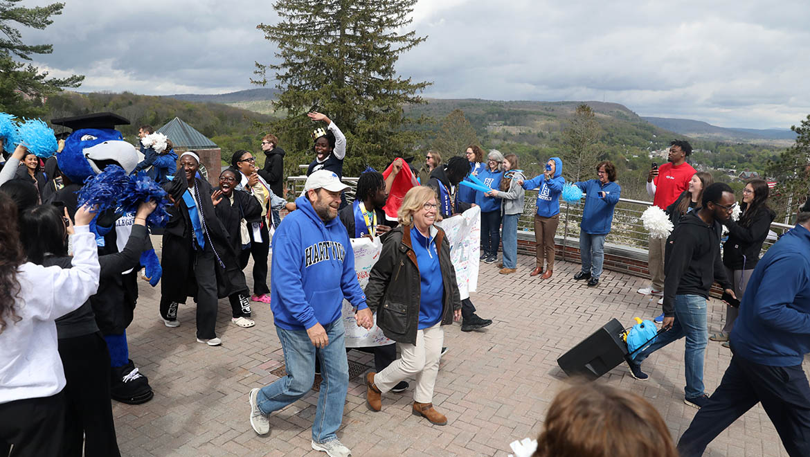 Hartwick College Seniors during Last Walk on Founders' Way before Commencement with President-elect Laurel Bongiorno and her husband Chuck