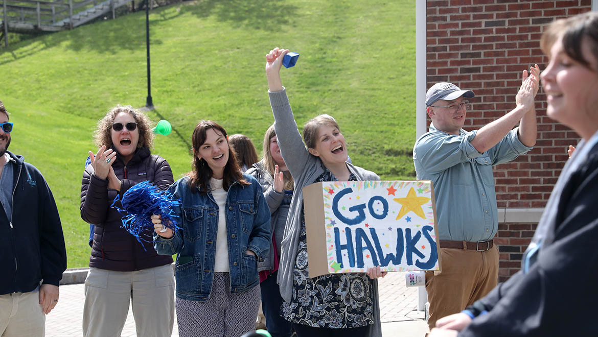 Hartwick College faculty and staff cheering senior class during Last Walk on Founders' Way