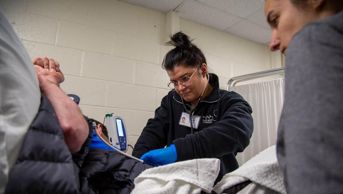 Hartwick nursing students treating emergency response drill patient