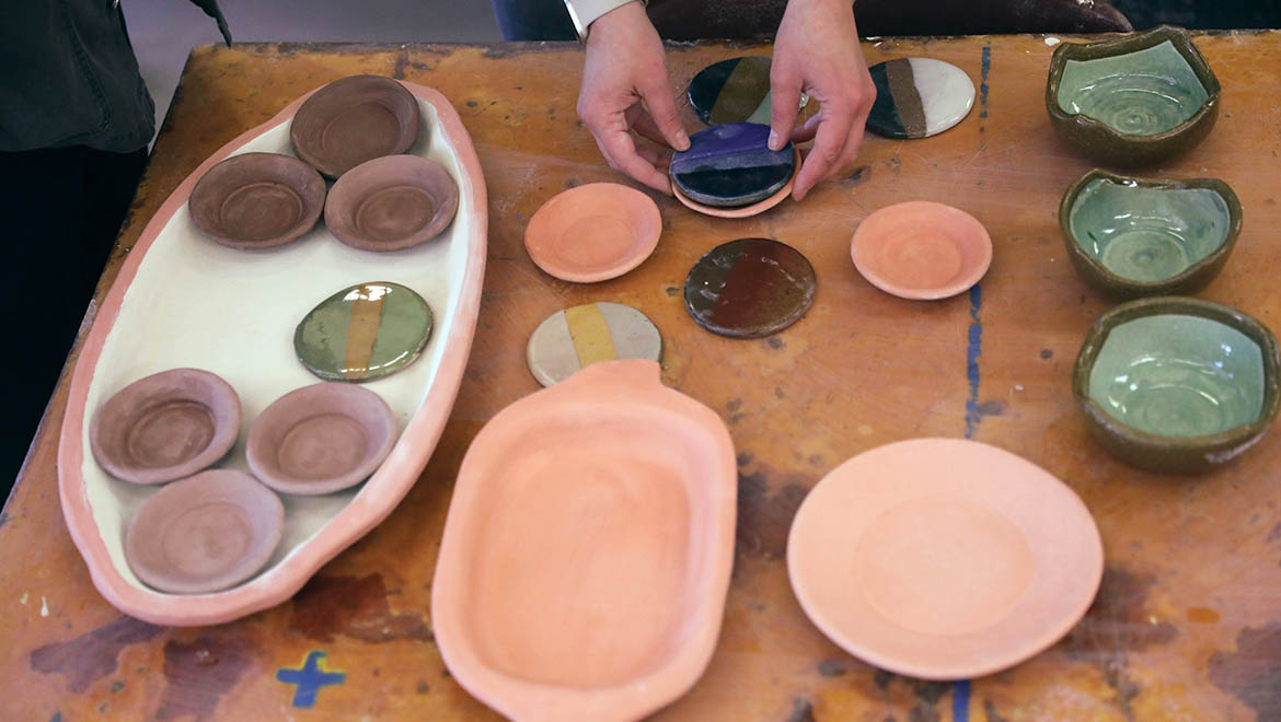 Dinnerware created by Hartwick ceramics students in ceramics studio