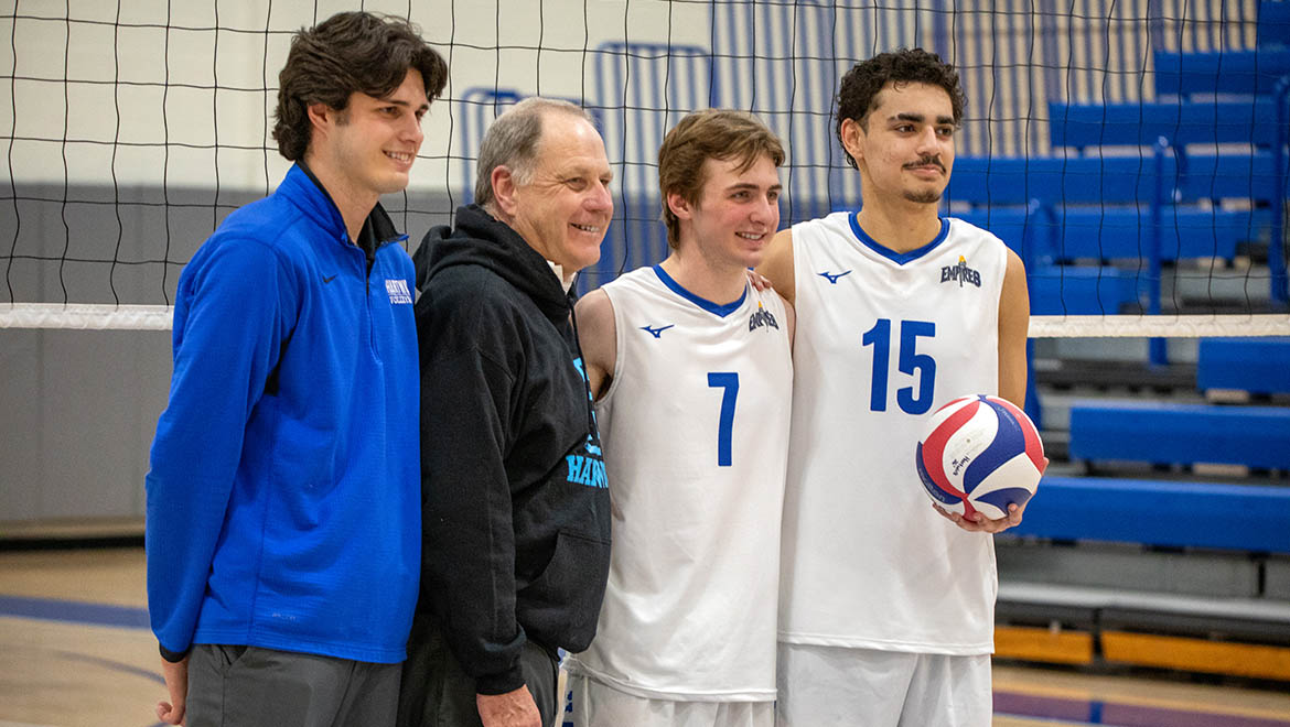 Nate Roorbach’29 with President Mullen, Men's Volleyball Coach Josh Bigford and Matt Ramirez '29
