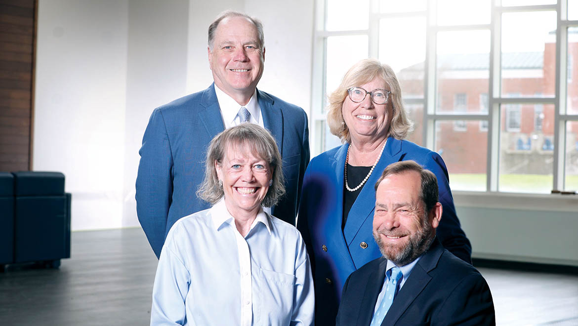 President Jim Mullen and his wife, Mari with President-elect Laurel Bongiorno, and her husband, Chuck in Stack Lounge
