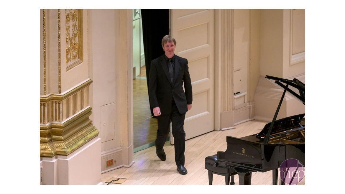 Music Department Co-Chair Andrew Pease entering stage at Carnegie Hall