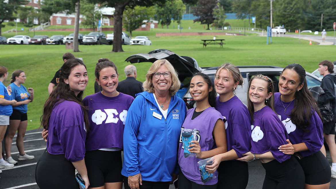 Members of Greek Life Helping Hands Move-In Volunteers with President Bongiorno