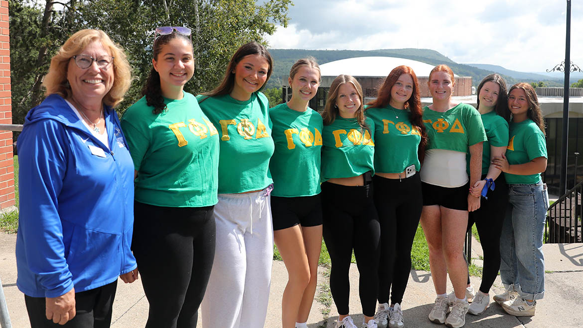 Members of Greek Life Helping Hands Move-In Volunteers with President Bongiorno