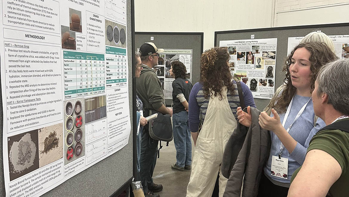 Megan Bryla discussin Freedman Research project poster titled 