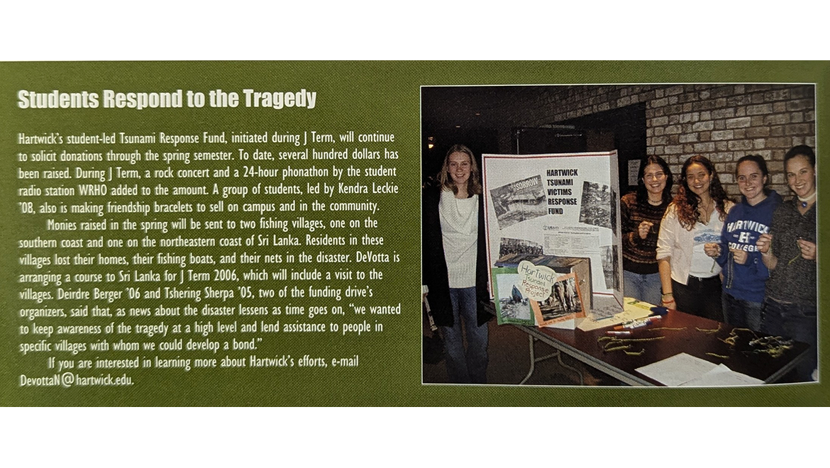 Five smiling female students stand behind a table with a 'Hartwick Tsunami Victims Response Fund' display board and craft supplies.