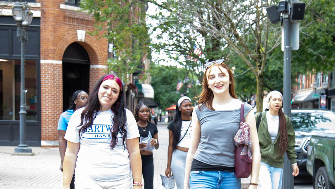 A group of Hartwick students walking in the City of Oneonta, NY.